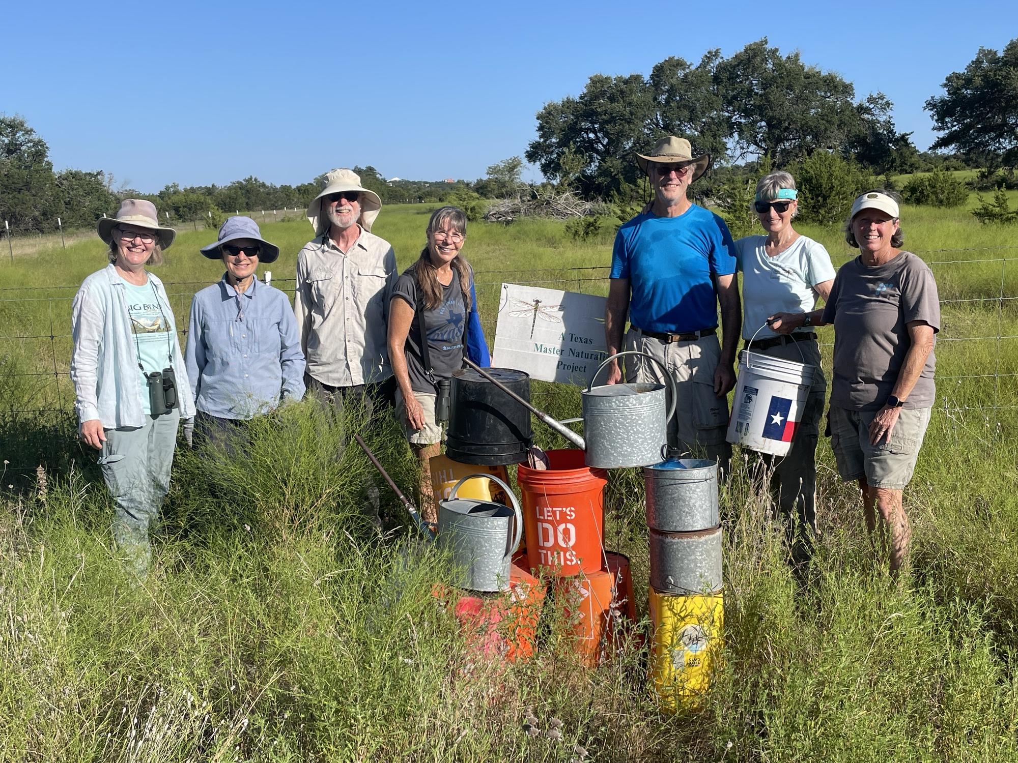 Hays County Master Naturalists get ready to water trees. PHOTO BY ROBERT DEPWE