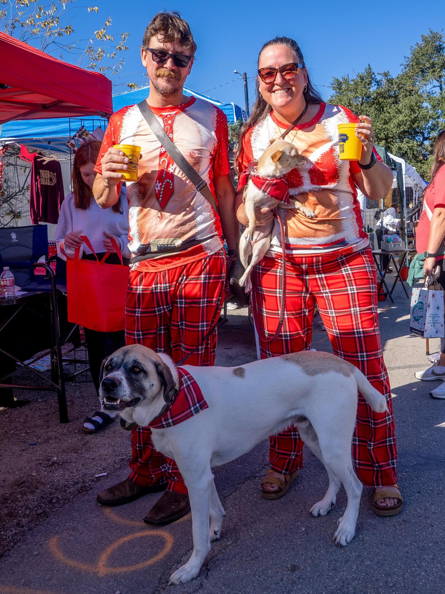 PHOTO BY DAVE WILSON Christmas on Mercer attendees get festive with matching...