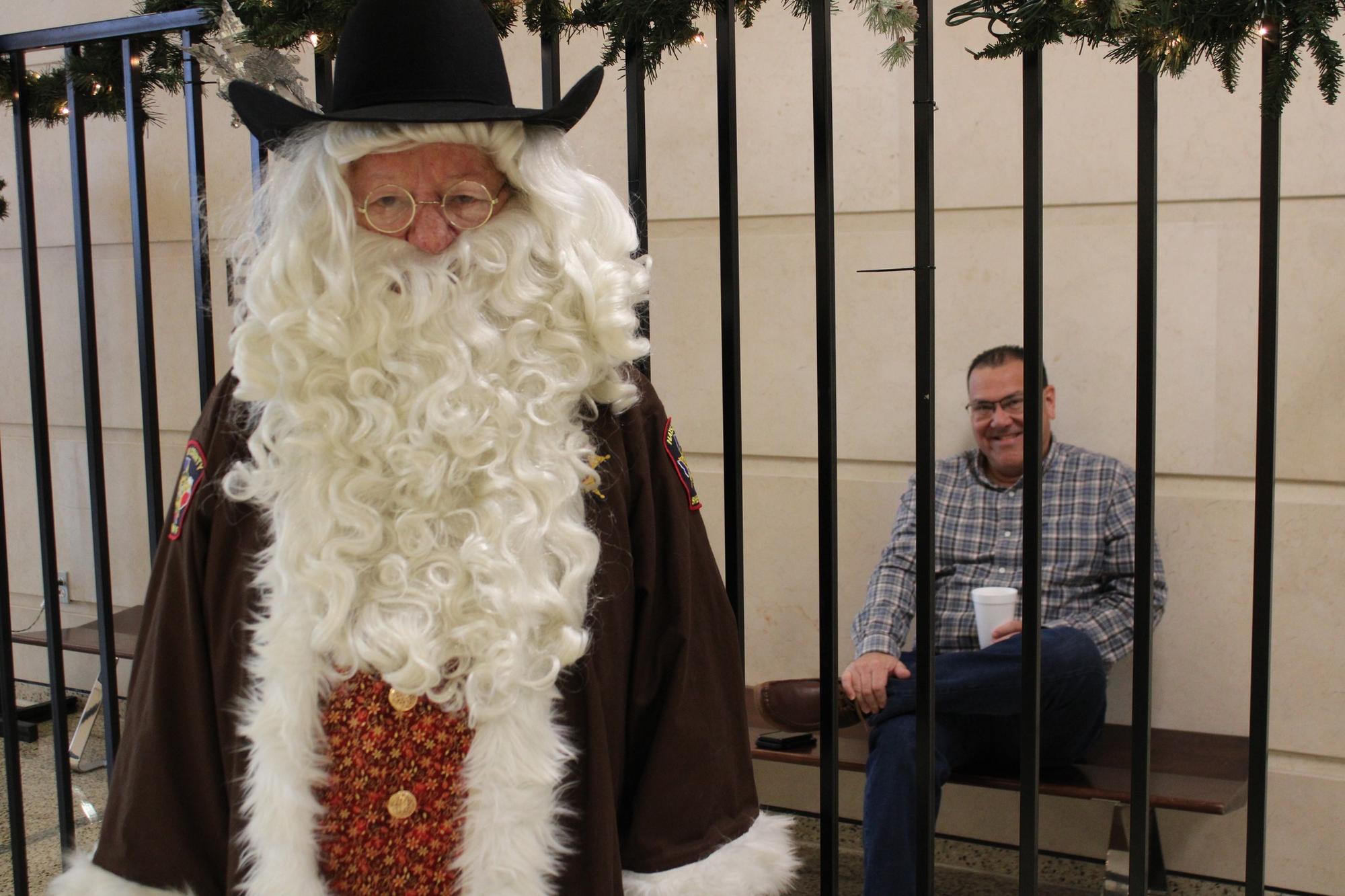 Photo courtesy of Hays County Sheriff’s Office Brown Santa with Hays County C...