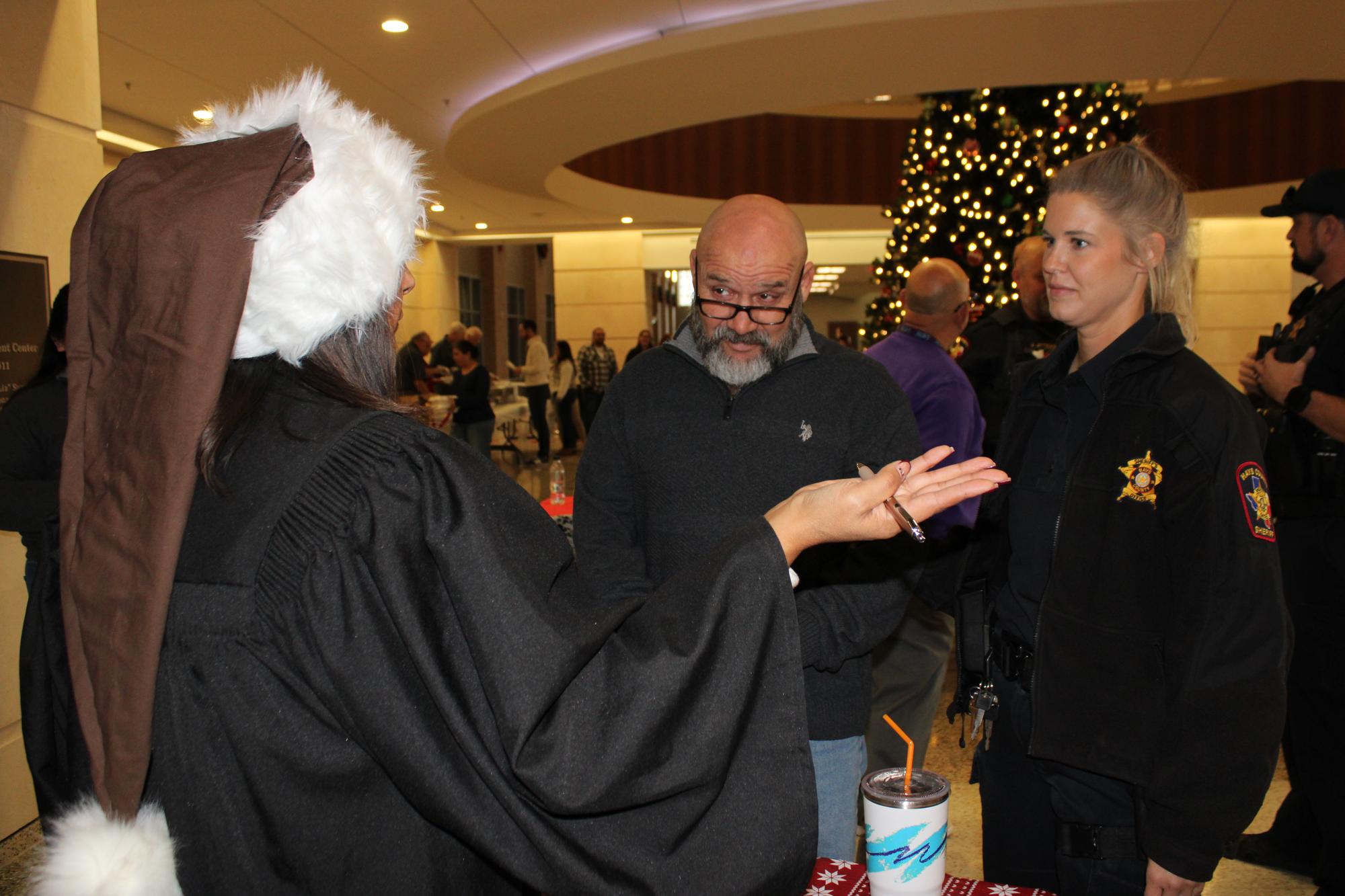 Photo courtesy of Hays County Sheriff’s Office From left: Justice of the Peac...