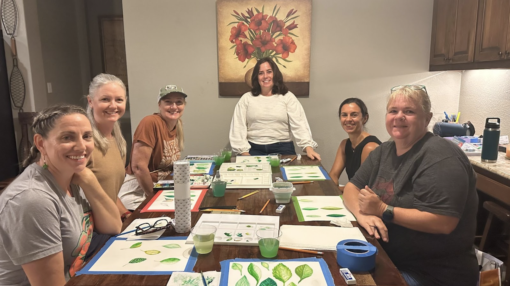 Ivy Sheppard (center) hosts the Watercolor Club.