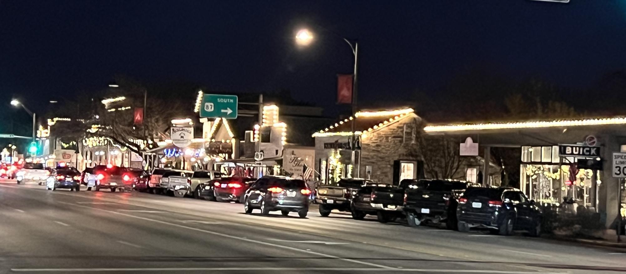 PHOTO BY LAURIE ANDERSON  Main Street in Fredericksburg lights up the night.